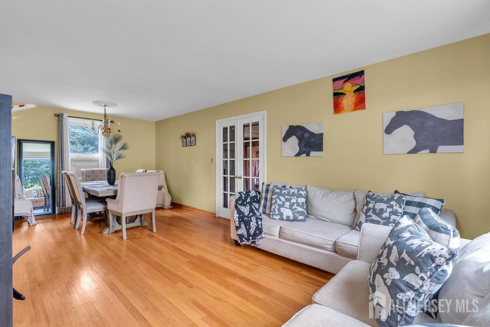 6 Carpender Road New Brunswick, NJ 08901 - Photo 6 of 30 a living room with furniture and a wooden floor
