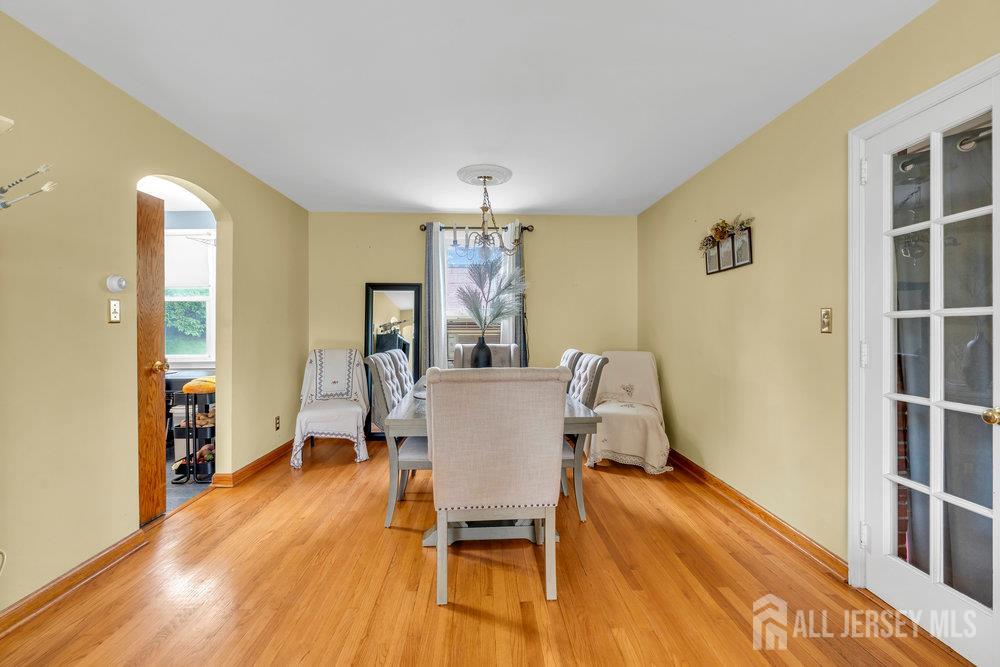 6 Carpender Road New Brunswick, NJ 08901 - Photo 9 of 30 a dining room with furniture and wooden floor