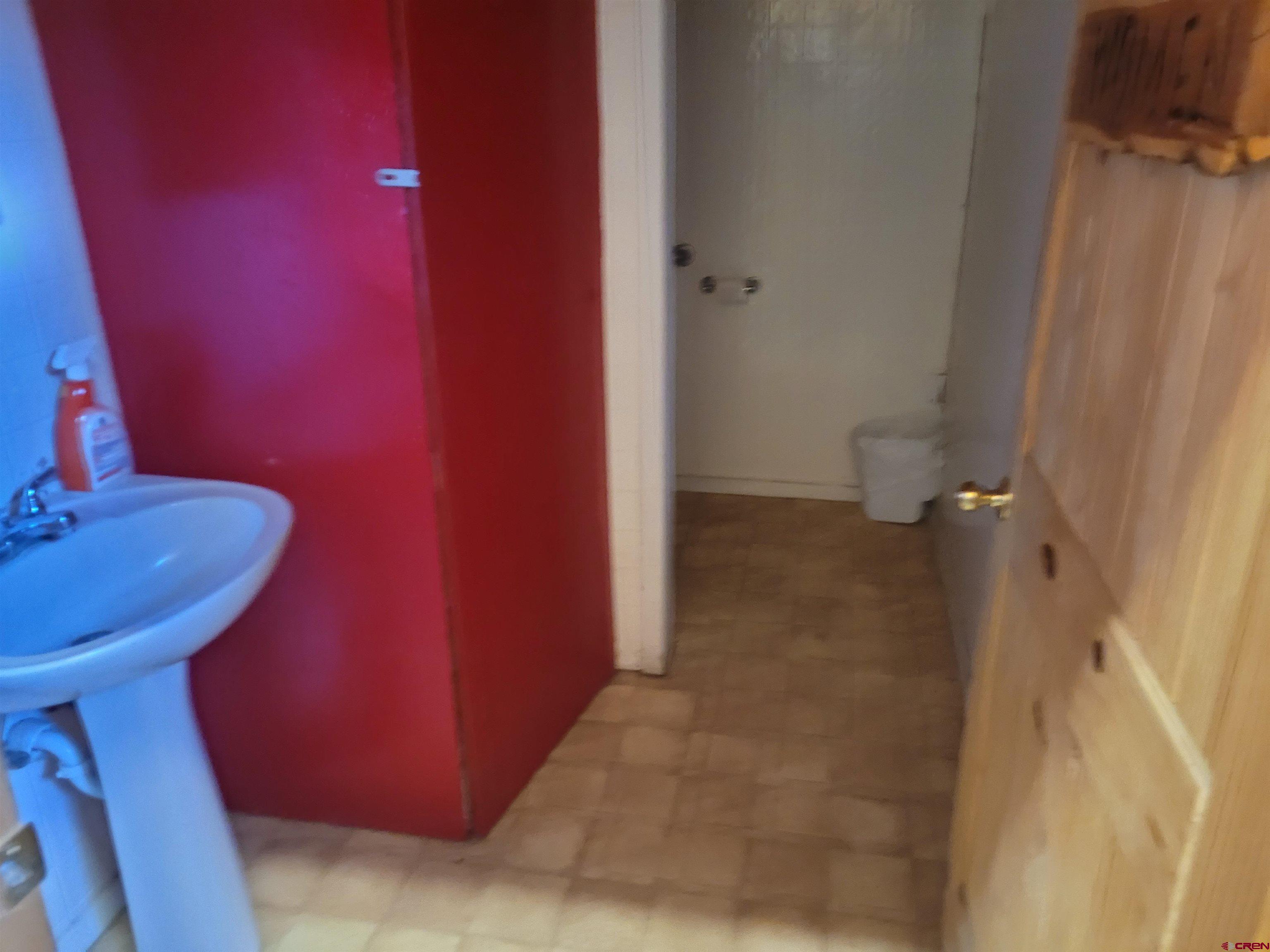 25 Clyde Street Moffat, CO 81143 - Photo 9 of 10 a bathroom with a sink and a toilet