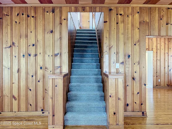 a view of a entryway with wooden floor