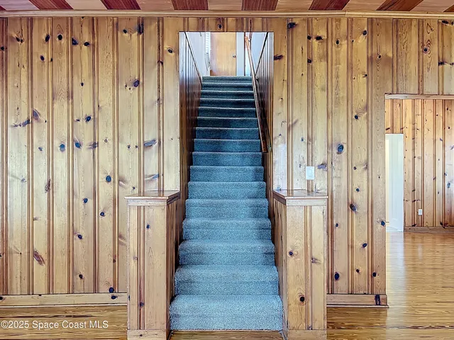 a view of a entryway with wooden floor