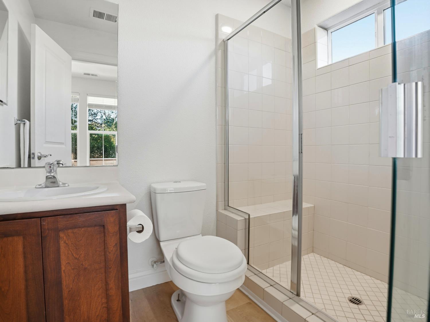 4424 Streamside Drive Santa Rosa, CA 95409 - Photo 45 of 55 a bathroom with a sink toilet and shower