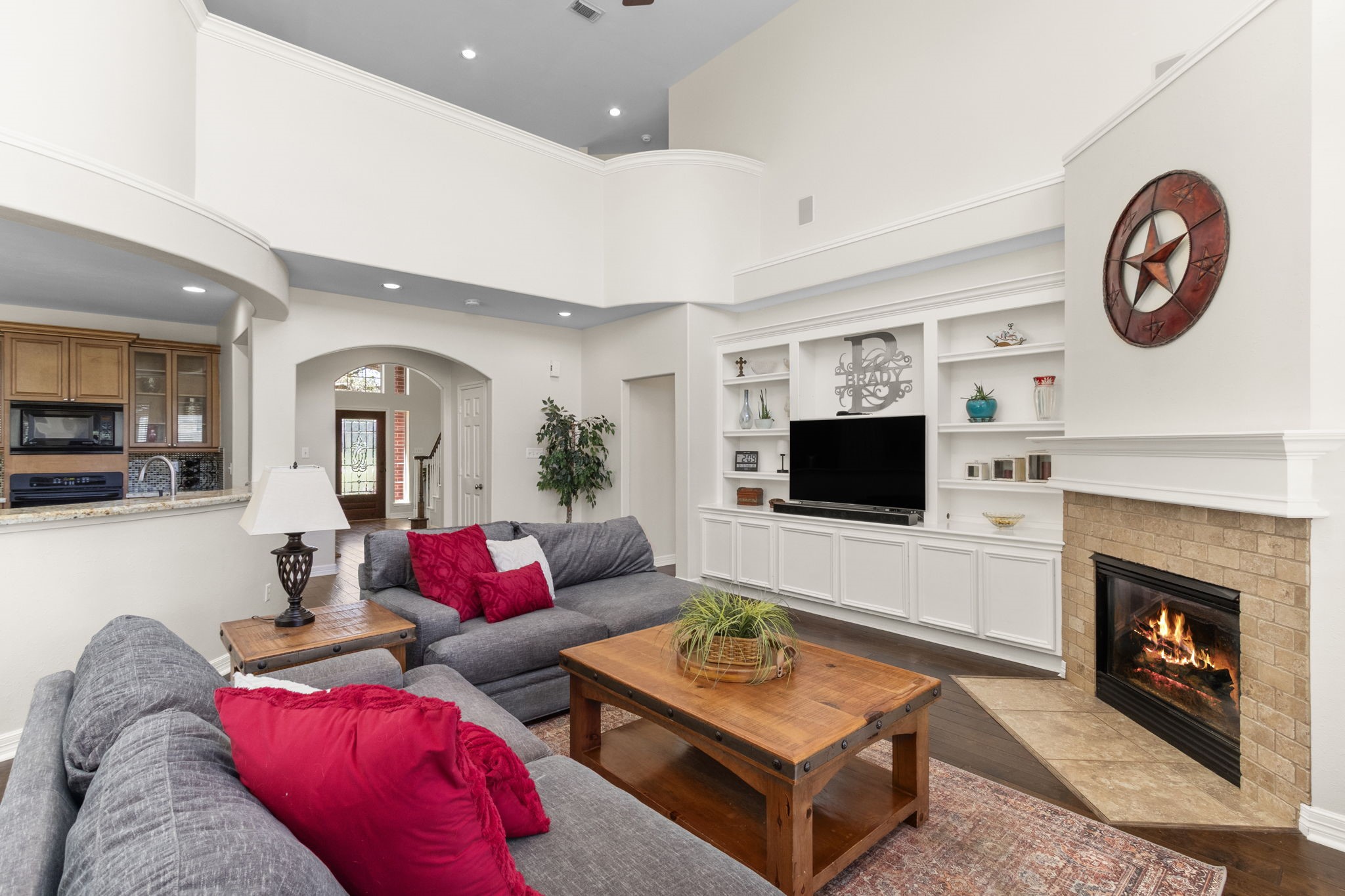 3610 Wellspring Lake Drive Fulshear, TX 77441 - Photo 12 of 45 a living room with furniture and a flat screen tv