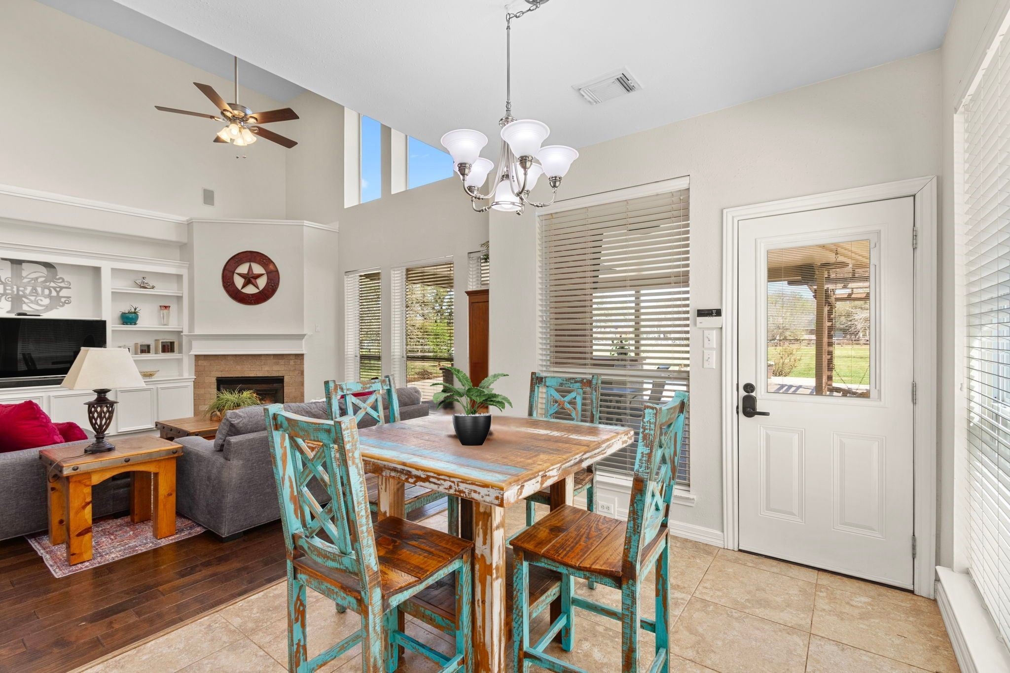3610 Wellspring Lake Drive Fulshear, TX 77441 - Photo 17 of 45 a view of a dining room with furniture window and wooden floor