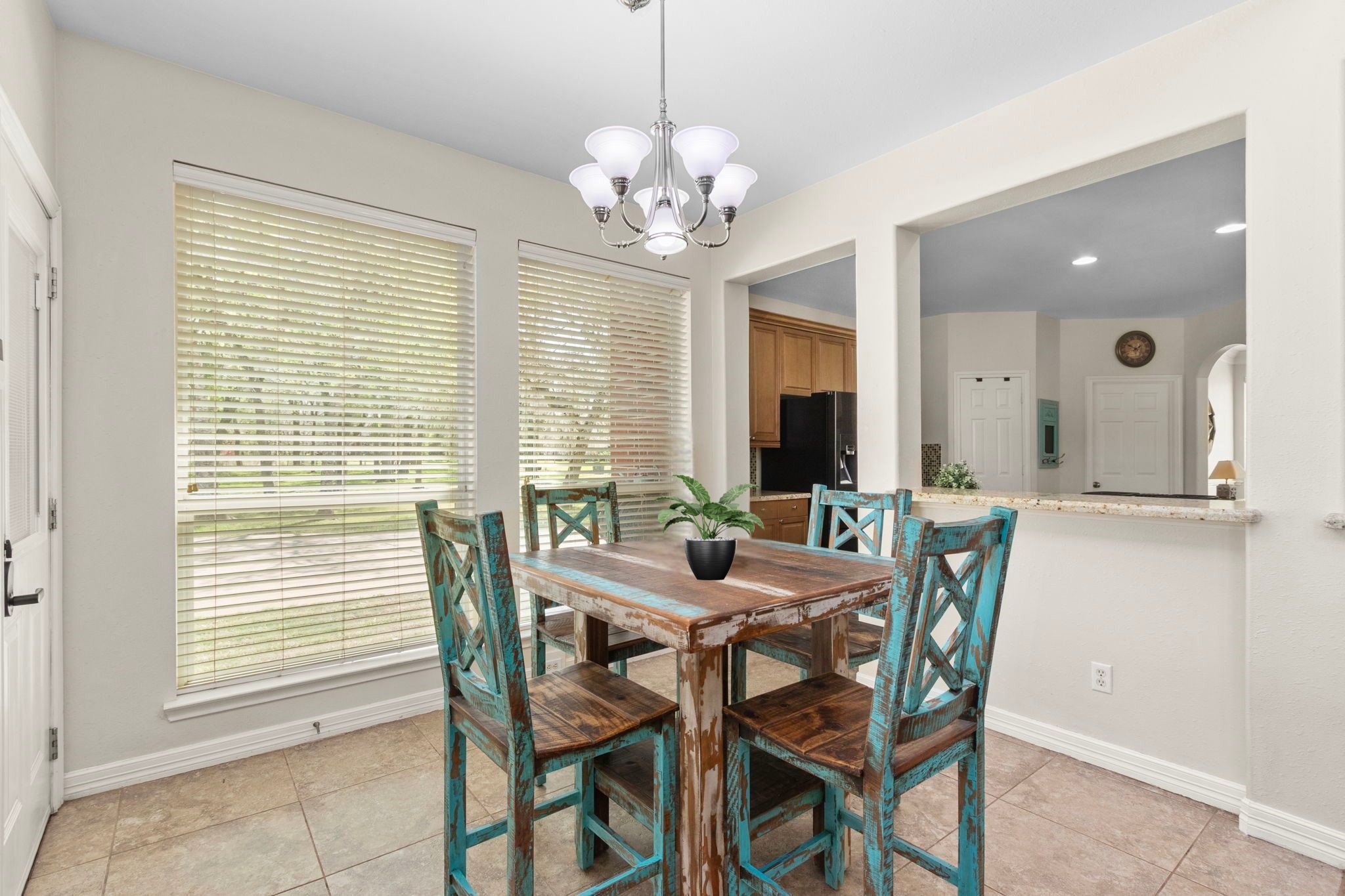 3610 Wellspring Lake Drive Fulshear, TX 77441 - Photo 18 of 45 a view of a dining room with furniture and a chandelier