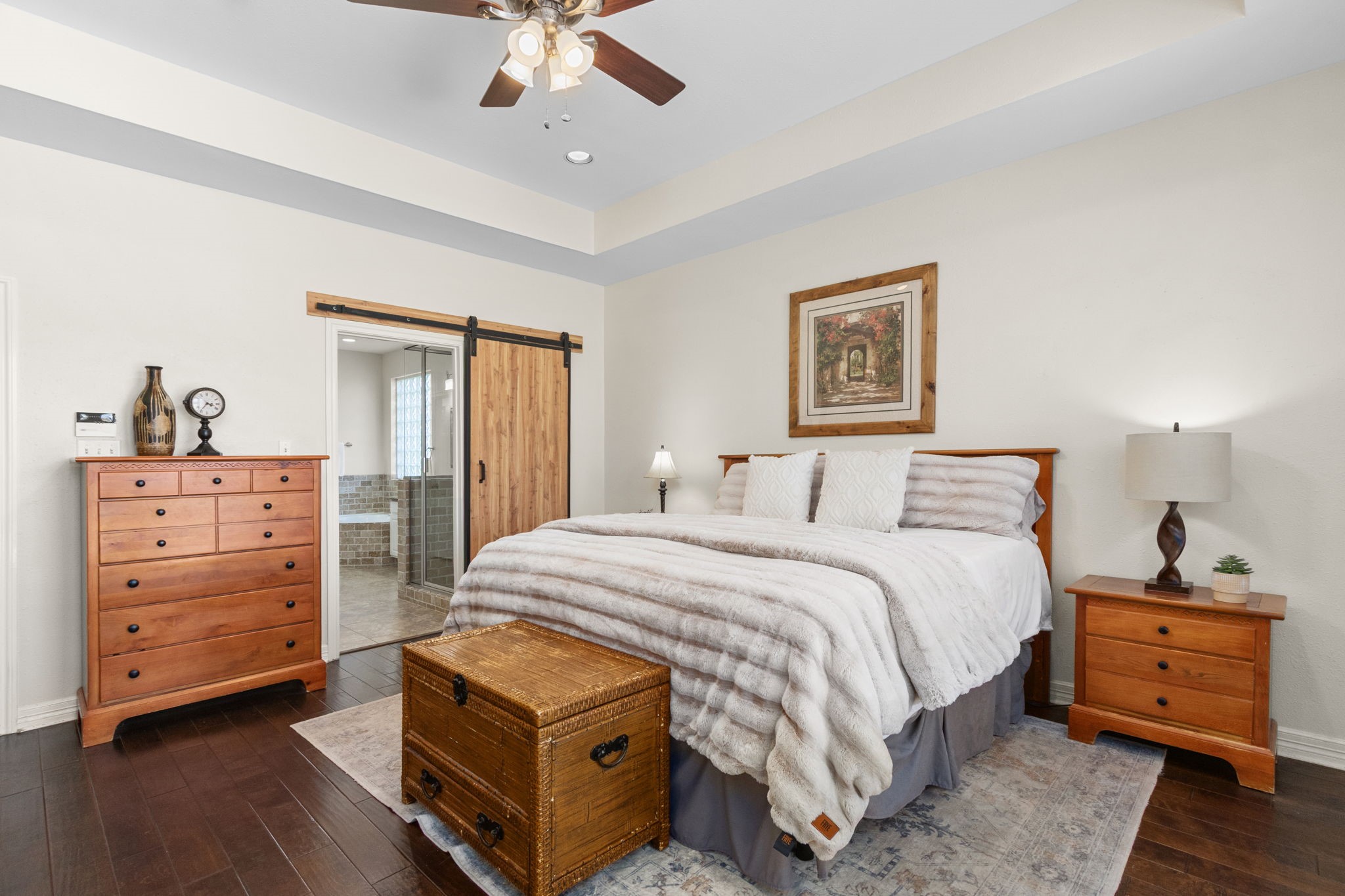 3610 Wellspring Lake Drive Fulshear, TX 77441 - Photo 20 of 45 a bedroom with a bed and a dresser