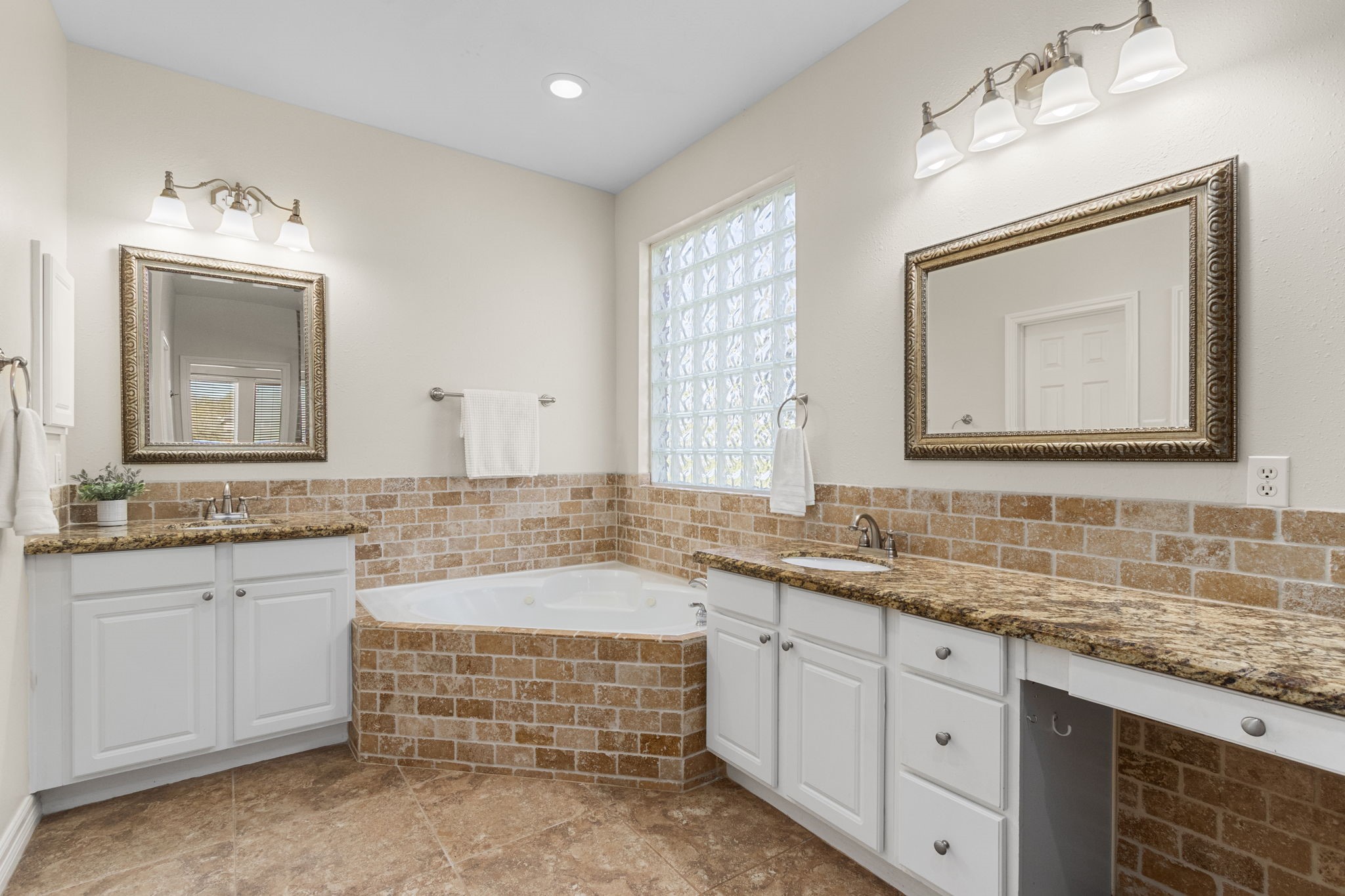 3610 Wellspring Lake Drive Fulshear, TX 77441 - Photo 21 of 45 a bathroom with a granite countertop double vanity sink and mirror