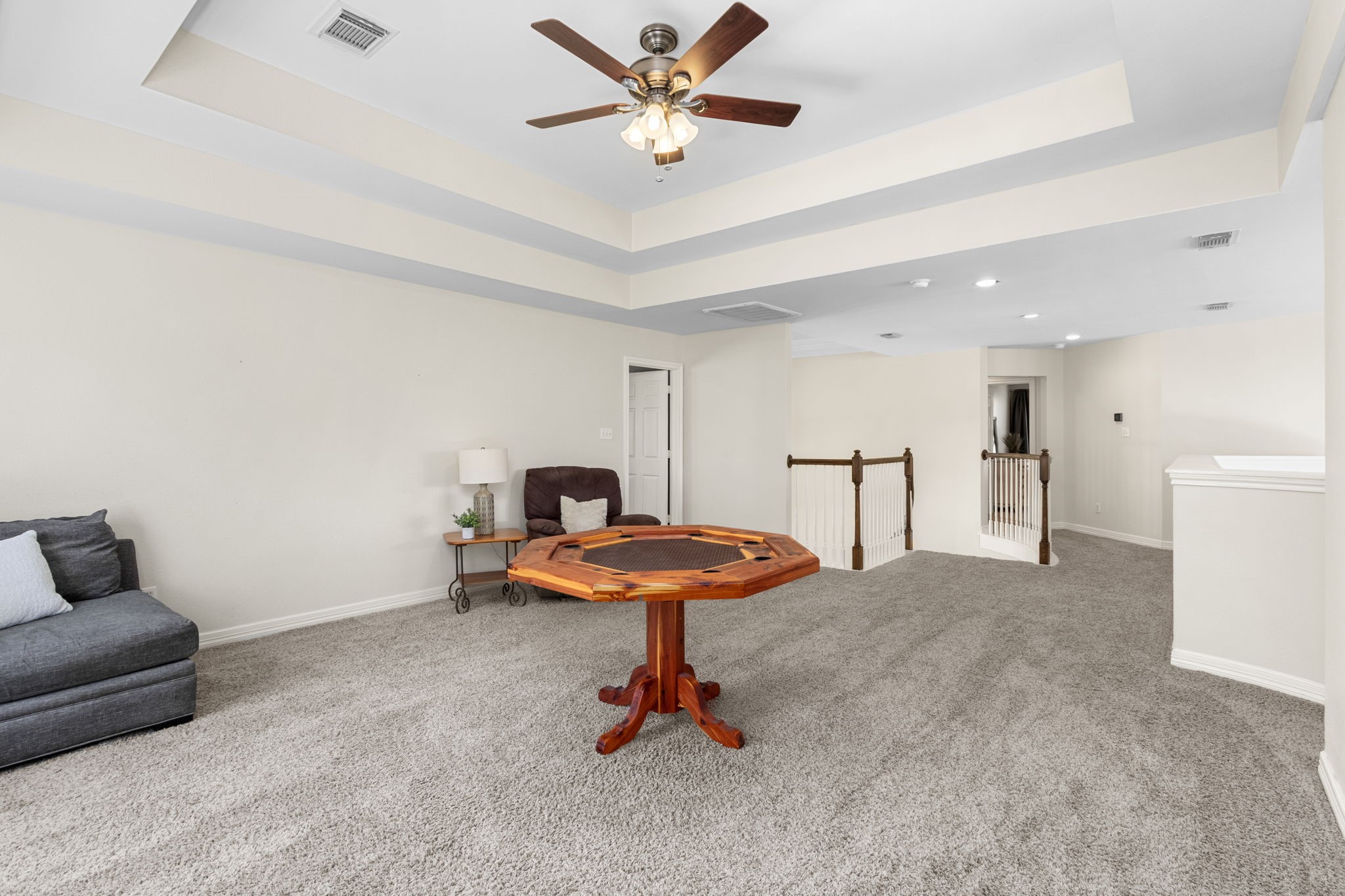 3610 Wellspring Lake Drive Fulshear, TX 77441 - Photo 24 of 45 a living room with furniture and a table