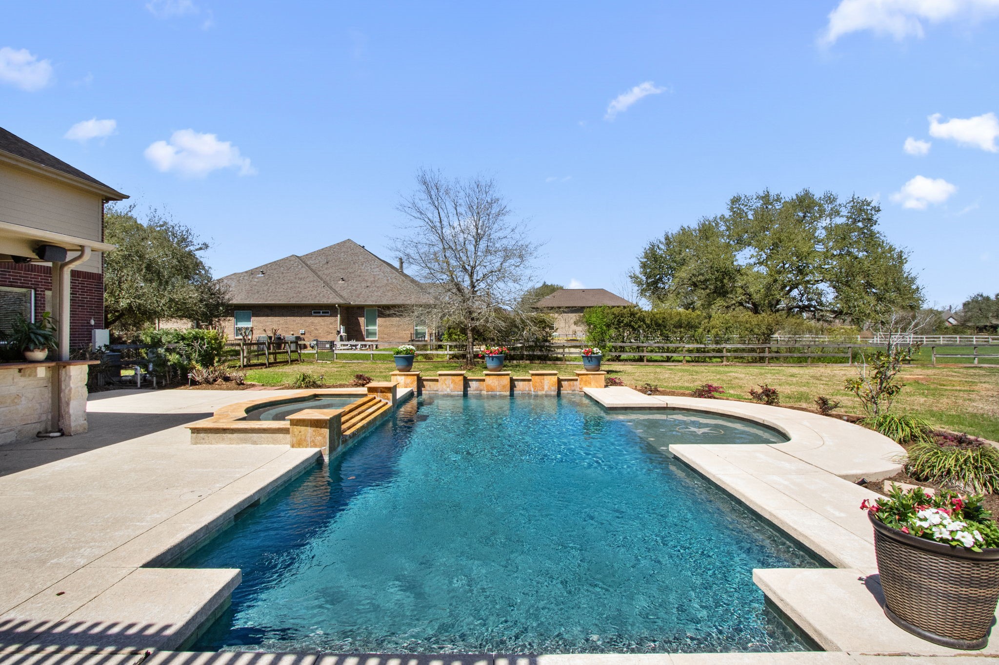 3610 Wellspring Lake Drive Fulshear, TX 77441 - Photo 35 of 45 a view of swimming pool with outdoor seating and plants