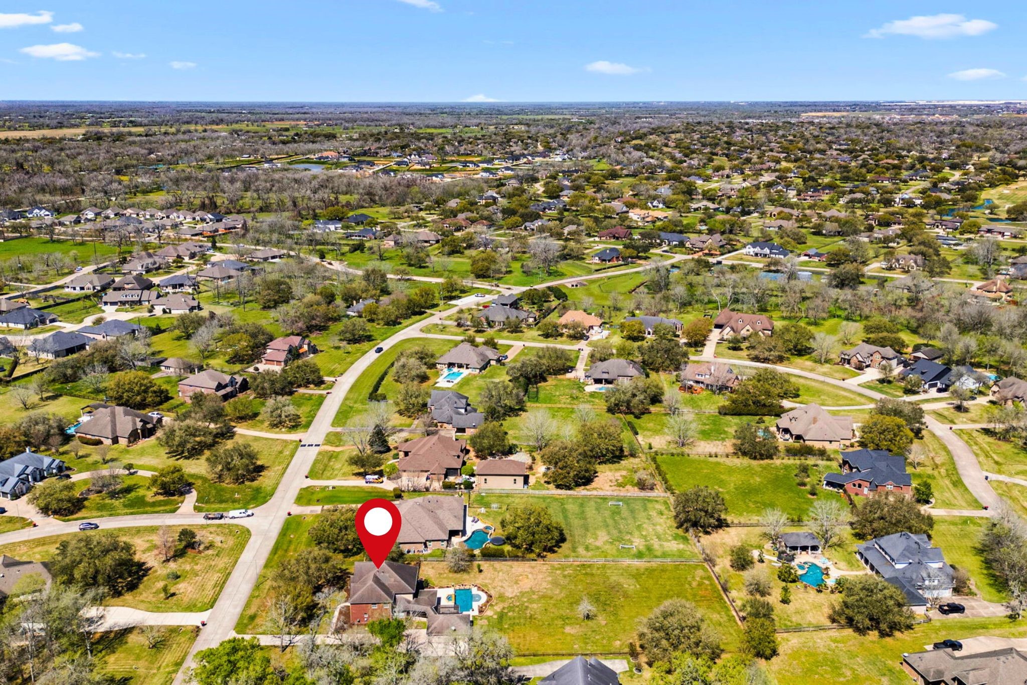 3610 Wellspring Lake Drive Fulshear, TX 77441 - Photo 40 of 45 an aerial view of residential building with parking space