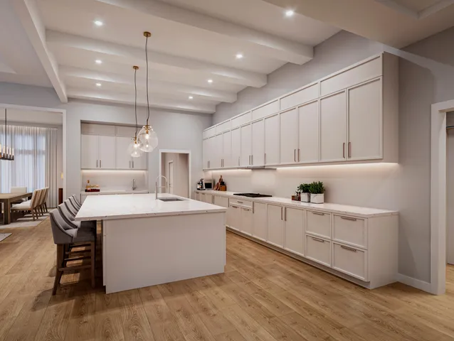 a kitchen with white cabinets and white appliances