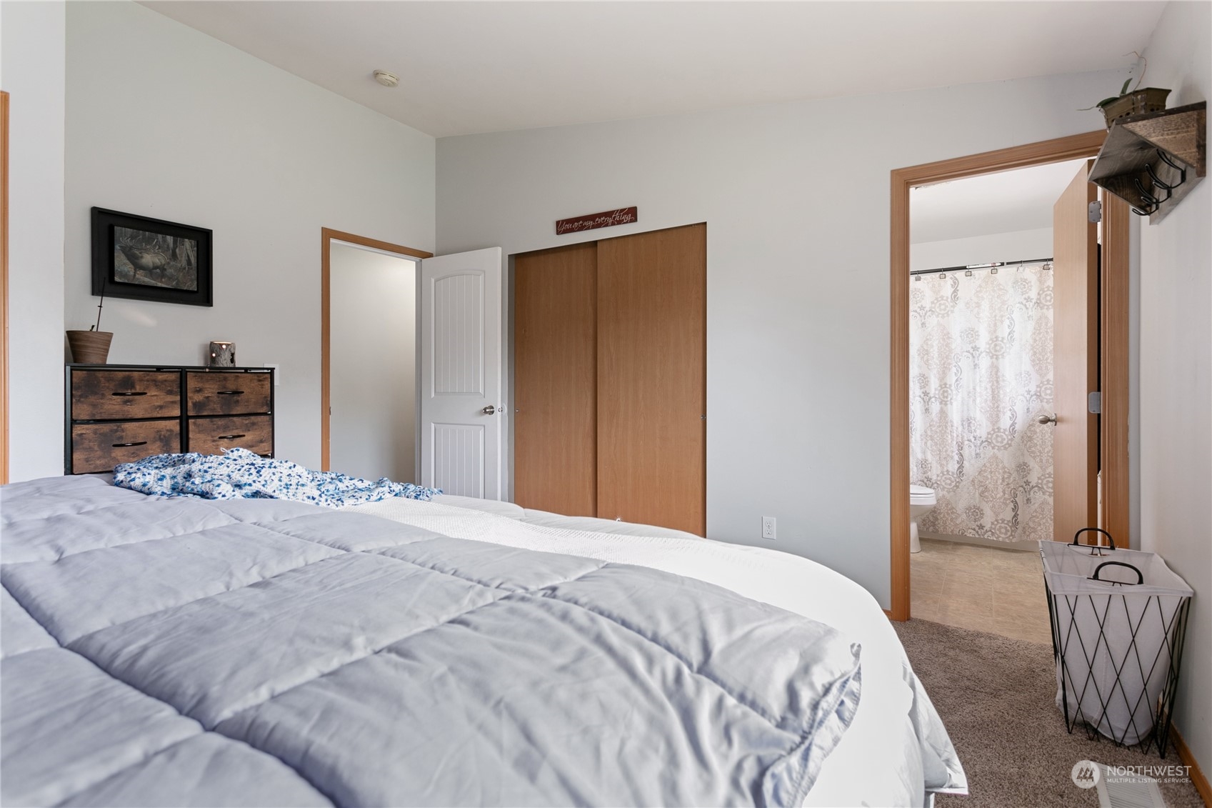 310 Allison Way Nooksack, WA 98276 - Photo 16 of 35 a bedroom with a bed and a dresser