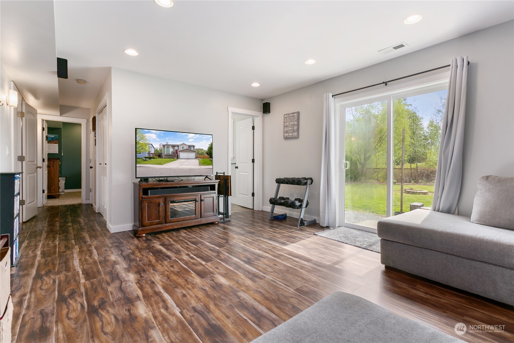 310 Allison Way Nooksack, WA 98276 - Photo 21 of 35 a living room with furniture and a floor to ceiling window