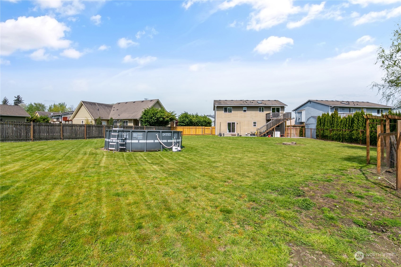 310 Allison Way Nooksack, WA 98276 - Photo 32 of 35 a view of a house with a big yard and large trees
