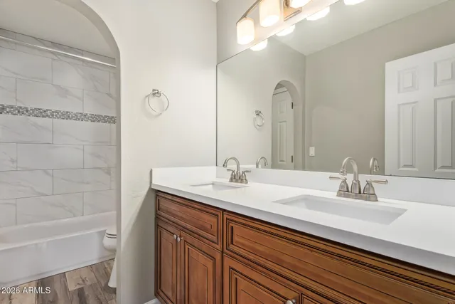 a bathroom with a sink and a bathtub