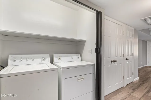 a utility room with dryer and washer