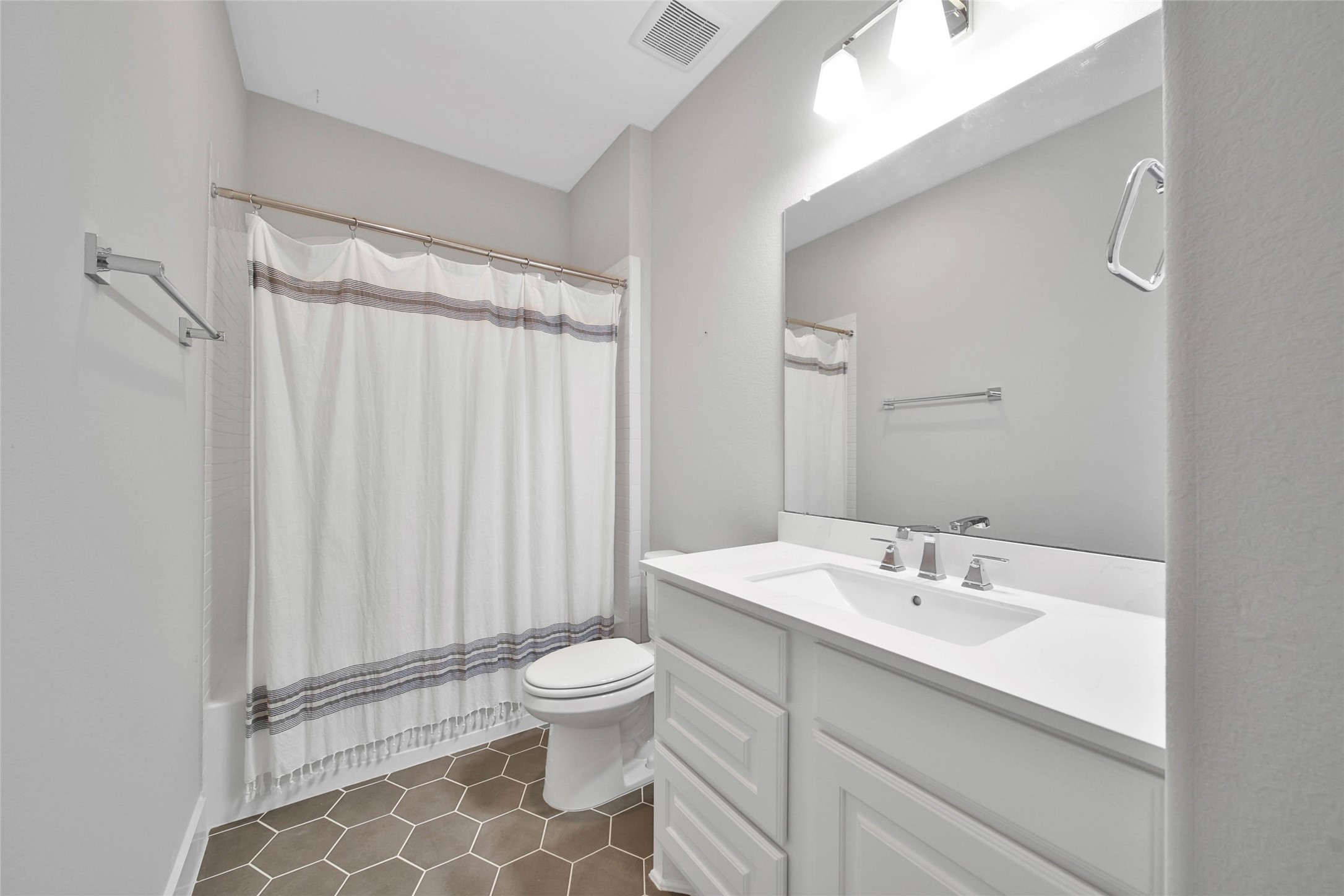 29402 Cir S Rnch Trail Fulshear, TX 77406 - Photo 36 of 50 This full bath is located in the hallway adjoining the bedroom and can also be accessed by upstairs guests in the game room.