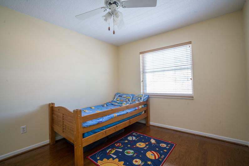 9721 Enchanted Pointe Lane Boca Raton, FL 33496 - Photo 16 of 25 a room with wooden bed and window