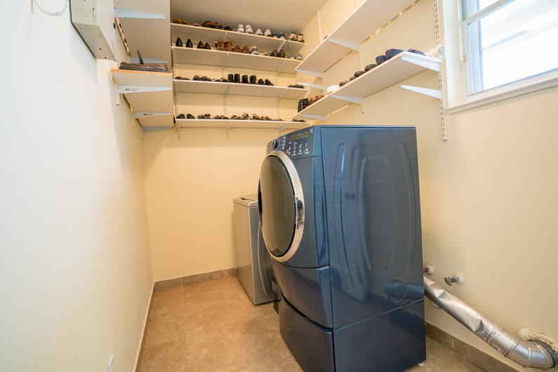 9721 Enchanted Pointe Lane Boca Raton, FL 33496 - Photo 17 of 25 a utility room with dryer and washer
