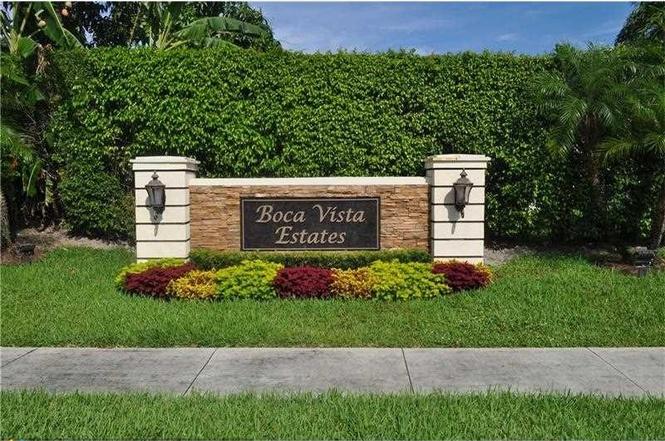 9721 Enchanted Pointe Lane Boca Raton, FL 33496 - Photo 24 of 25 a sign that is sitting in the grass