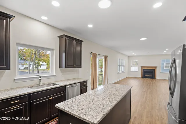 a kitchen with a stove and a sink
