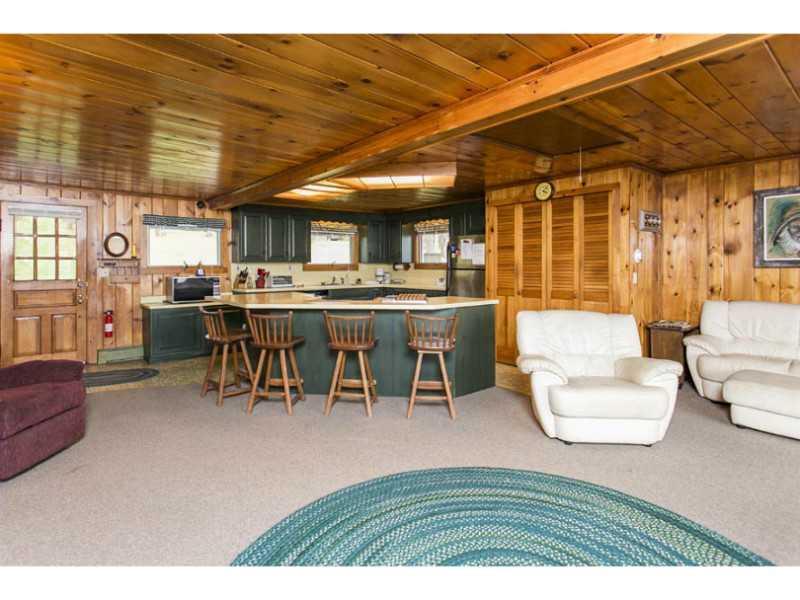 55 Shore Road Edgecomb, ME 04556 - Photo 7 of 21 Kitchen. The kitchen is open to the...