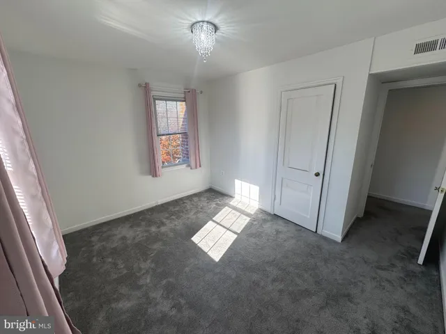 en empty room with windows