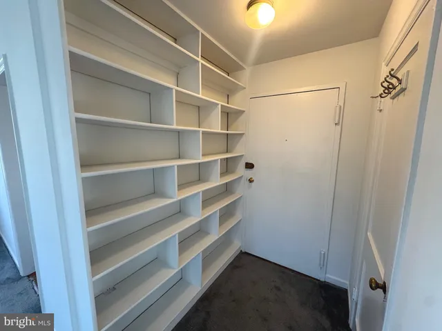 a view of a balcony with wooden floor and outdoor space