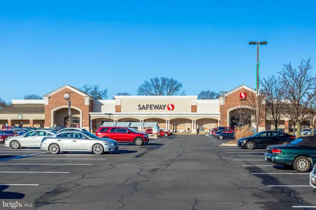 a view of parking space with parked cars