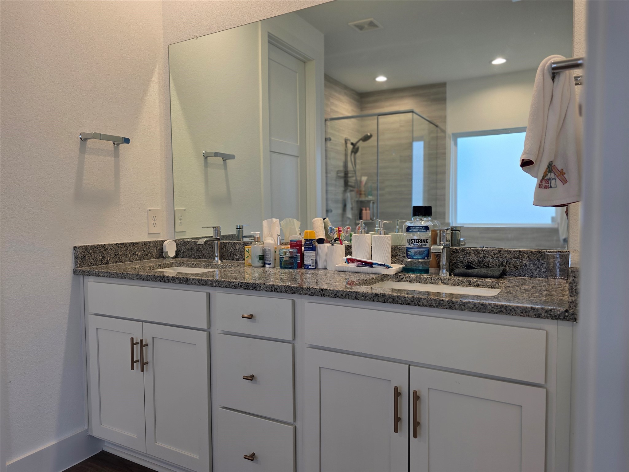 13725 Rising Sun Lane Conroe, TX 77384 - Photo 13 of 29 a bathroom with double sink and a mirror