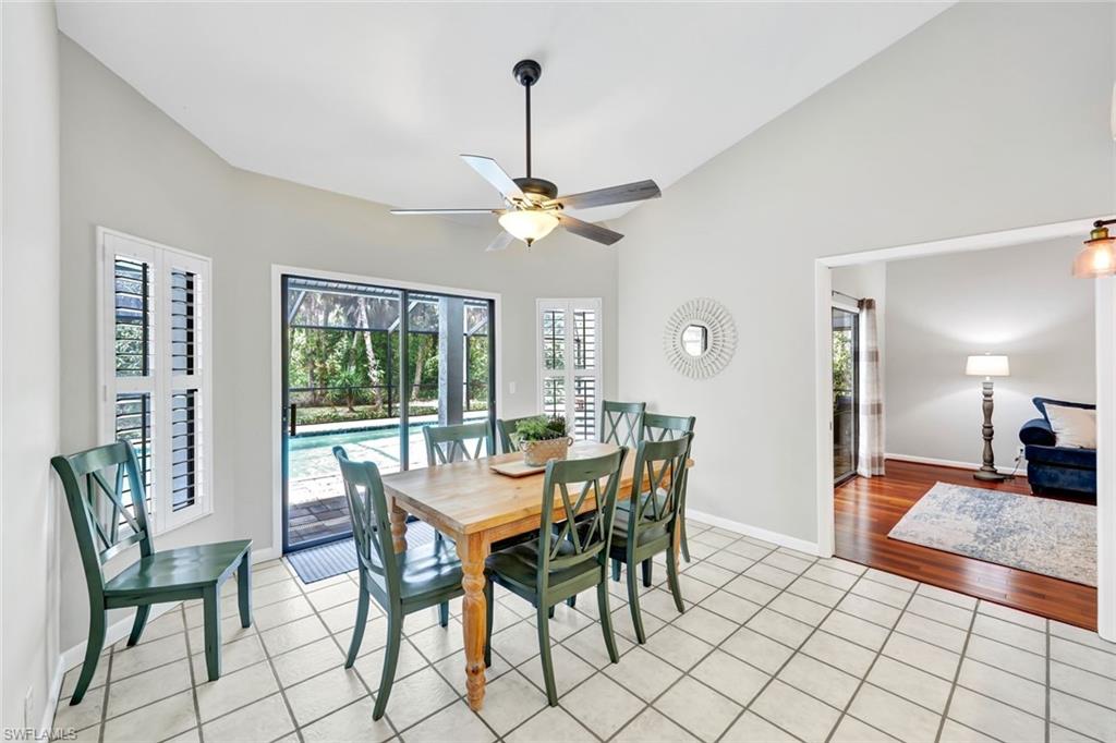 4530 13th Avenue Southwest Naples, FL 34116 - Photo 14 of 30 a view of a dining room with furniture