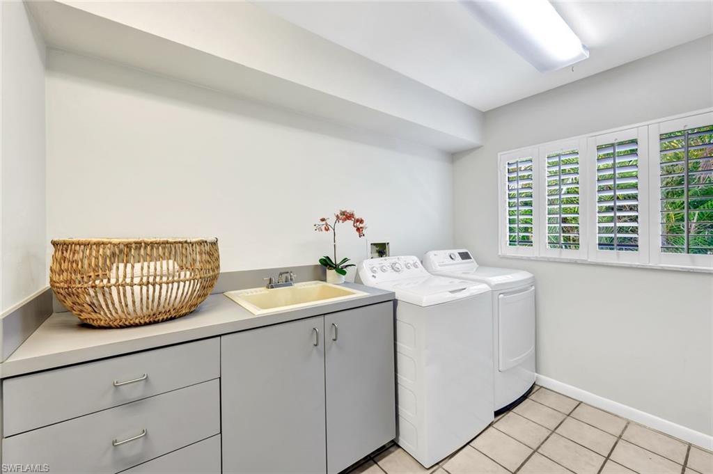 4530 13th Avenue Southwest Naples, FL 34116 - Photo 22 of 30 a utility room with dryer and washer