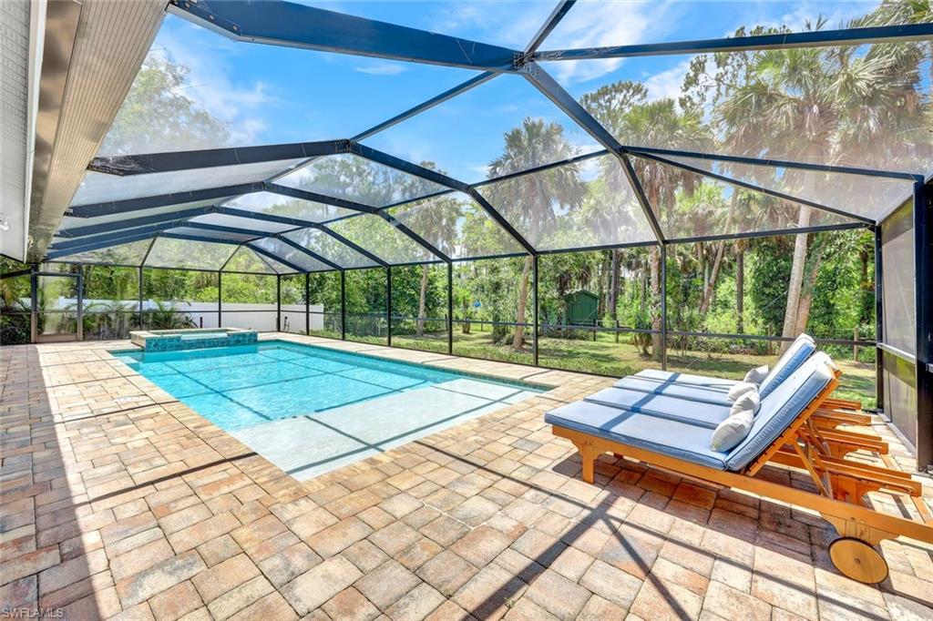 4530 13th Avenue Southwest Naples, FL 34116 - Photo 28 of 30 a view of an outdoor space with a swimming pool
