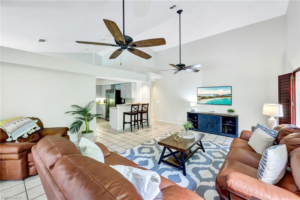 4530 13th Avenue Southwest Naples, FL 34116 - Photo 6 of 30 a living room with furniture
