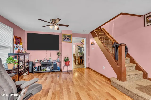 a view of a living room and a flat screen tv