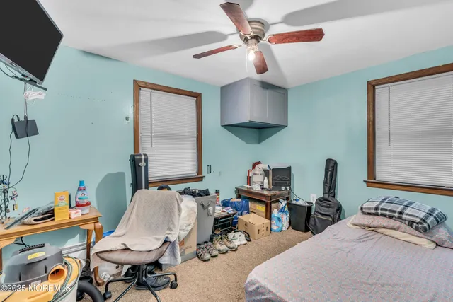 a bedroom with furniture and a bed