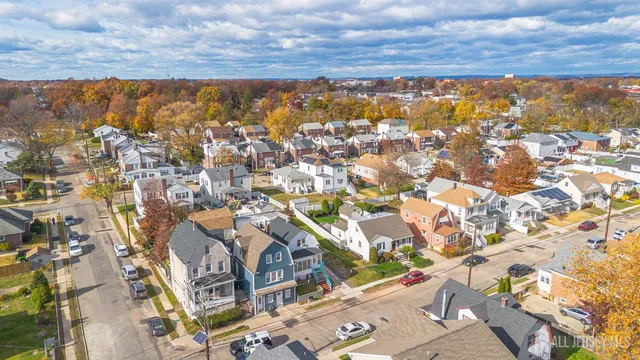 an aerial view of residential building with parking space