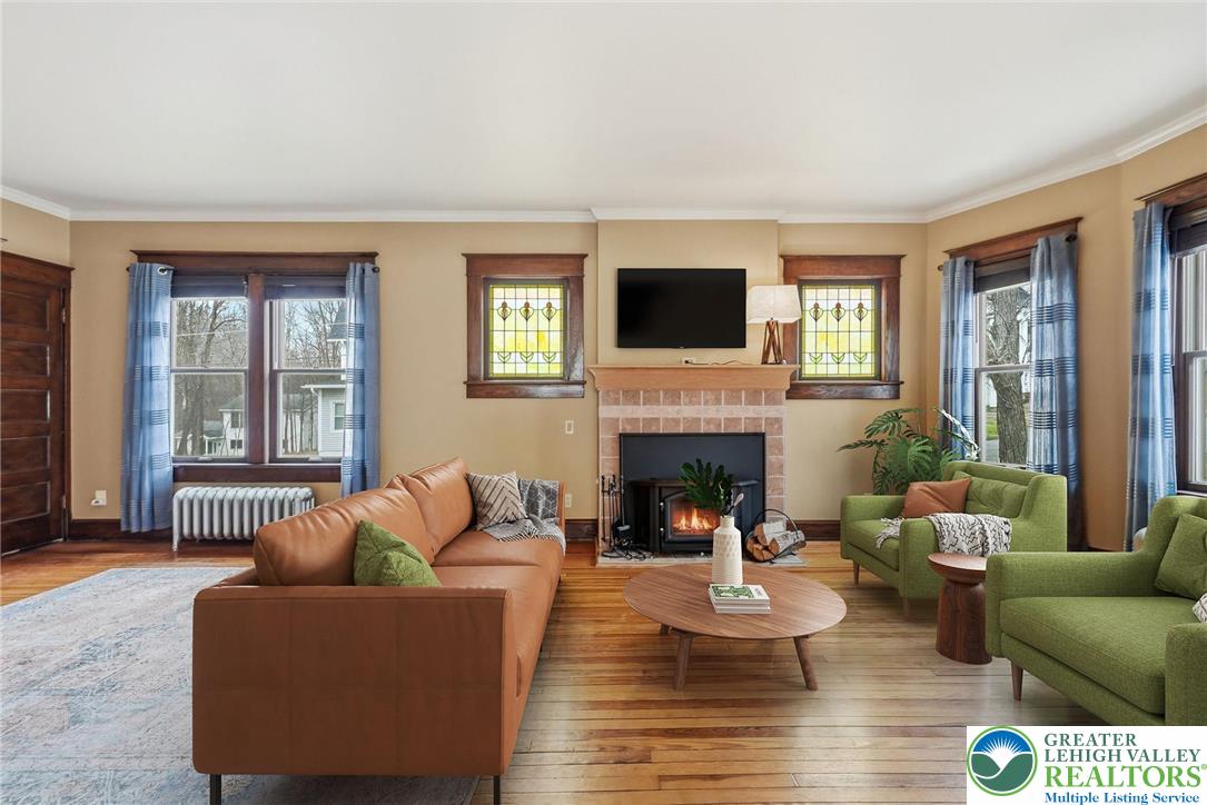 802 Poplar Street Clarks Summit, PA 18411 - Photo 11 of 50 a living room with furniture and a fireplace