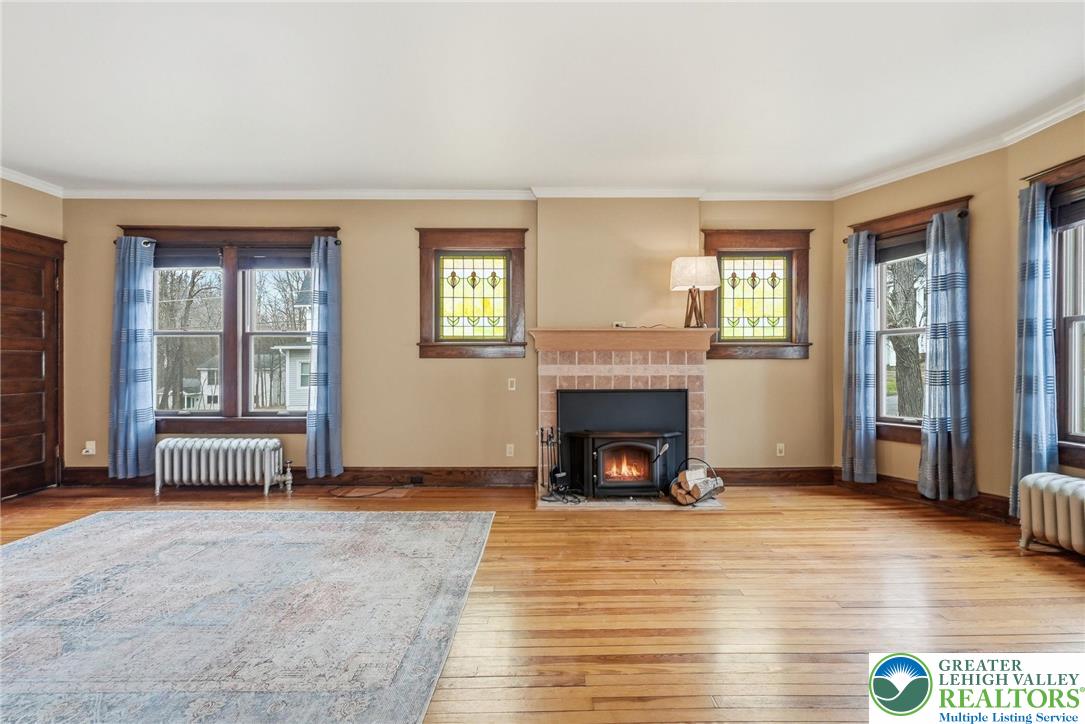 802 Poplar Street Clarks Summit, PA 18411 - Photo 14 of 50 a view of empty room with a fireplace and a window