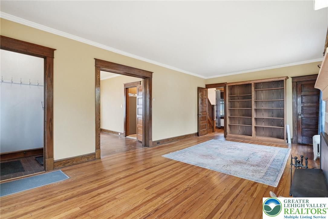 802 Poplar Street Clarks Summit, PA 18411 - Photo 15 of 50 a view of an empty room with wooden floor and a window