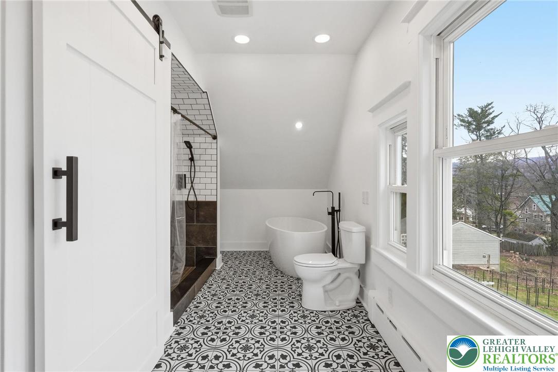 802 Poplar Street Clarks Summit, PA 18411 - Photo 27 of 50 a bathroom with a toilet a sink and a shower
