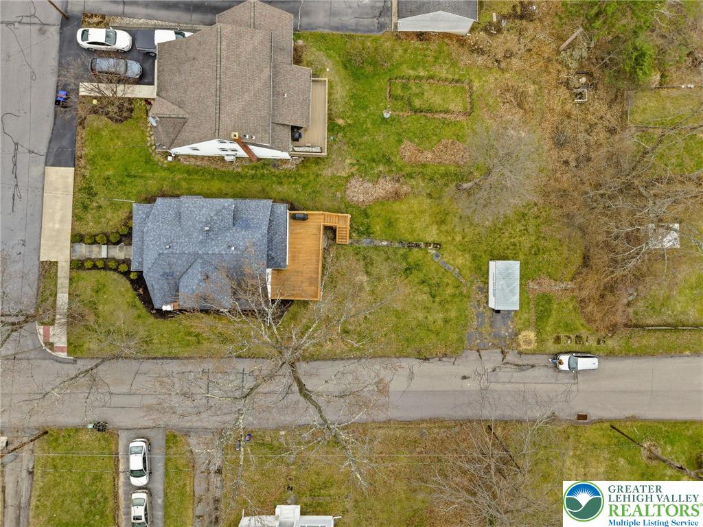 802 Poplar Street Clarks Summit, PA 18411 - Photo 49 of 50 an aerial view of a house with a yard