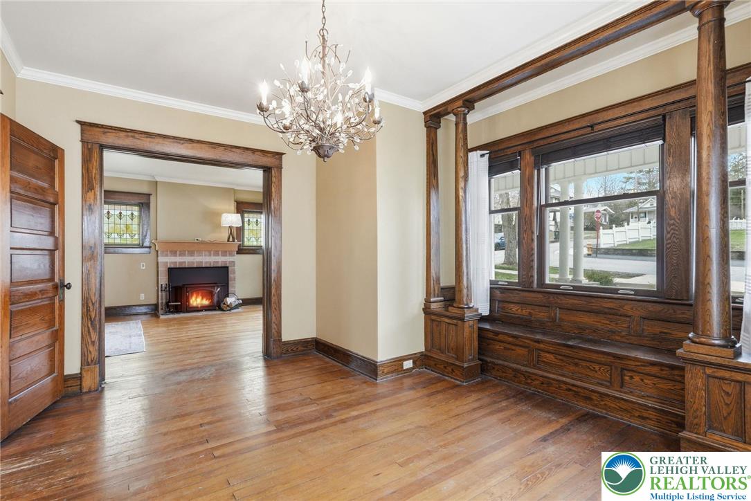 802 Poplar Street Clarks Summit, PA 18411 - Photo 5 of 50 a view of a room with wooden floor fireplace and windows