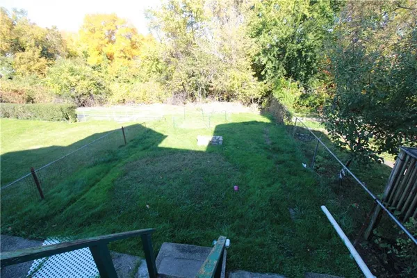 a view of a house with a swimming pool