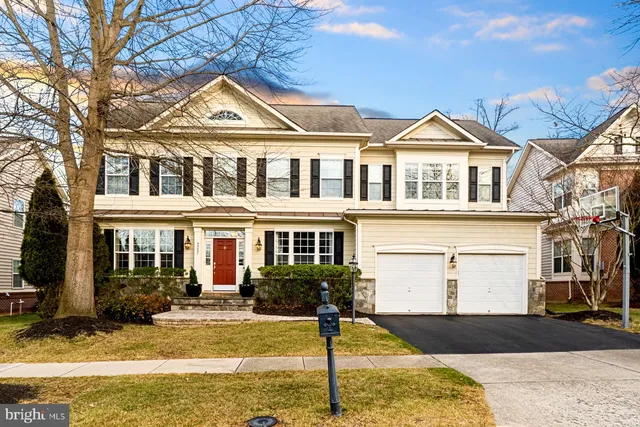 a front view of a house with swimming pool