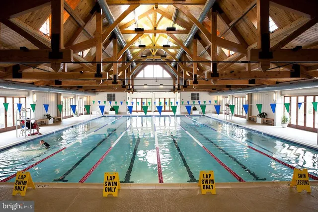 a view of a living room with furniture and a window
