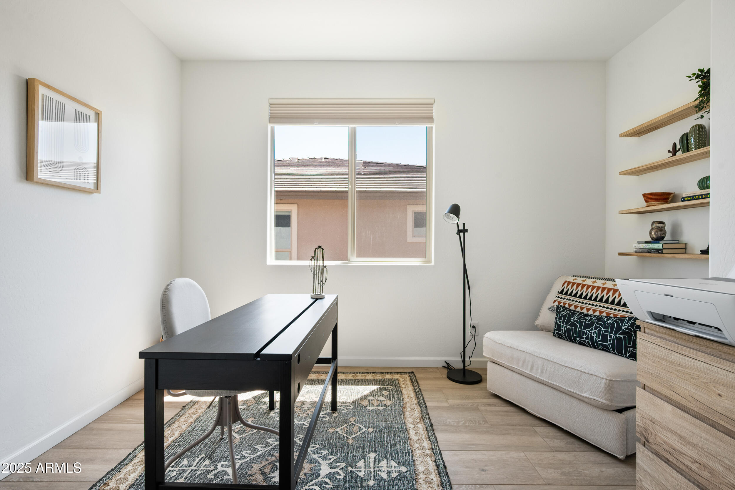 18328 East Spring Valley Court Rio Verde, AZ 85263 - Photo 24 of 39 a living room with furniture and a window
