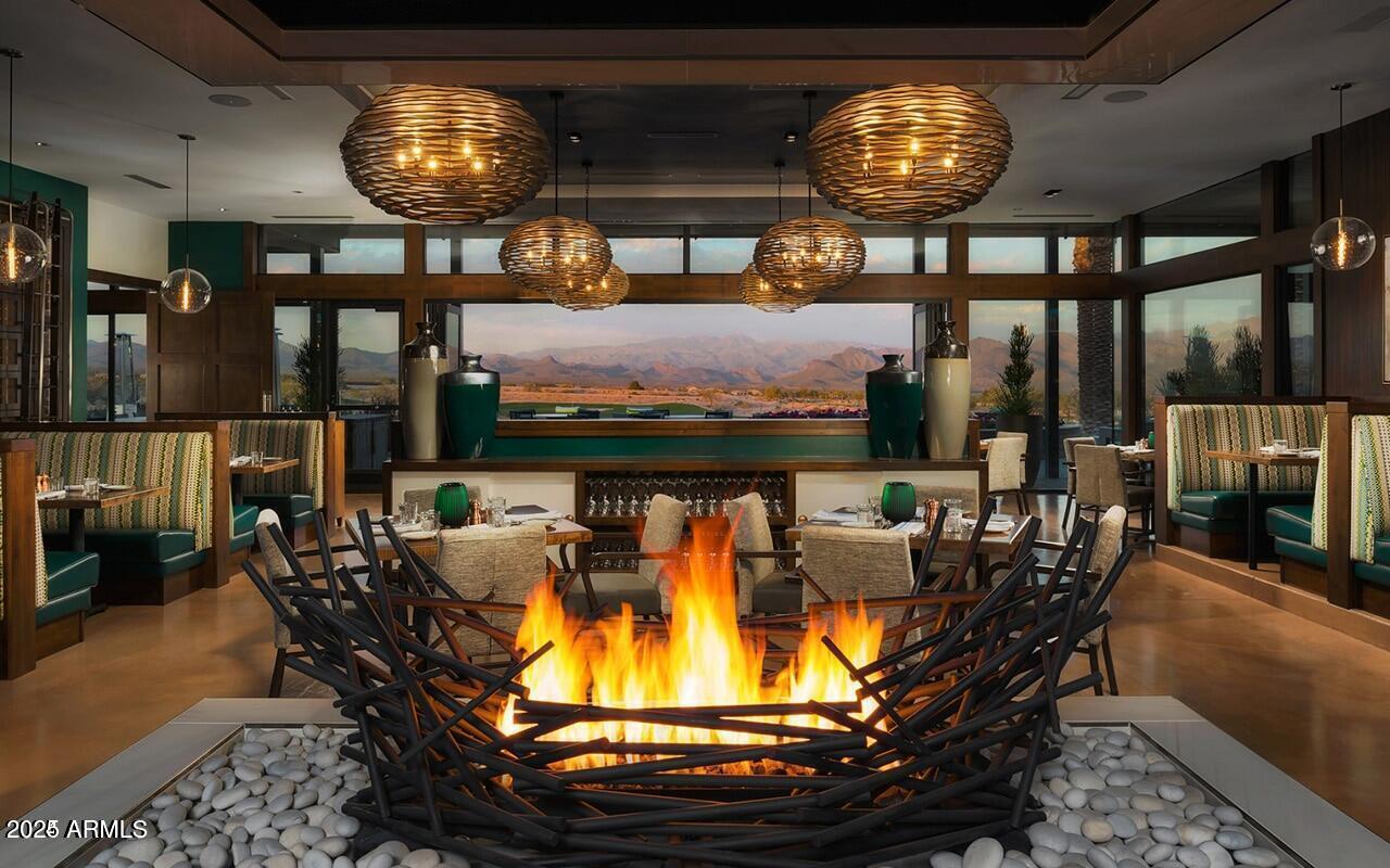 18328 East Spring Valley Court Rio Verde, AZ 85263 - Photo 30 of 39 a view of a dining room with furniture window and outside view