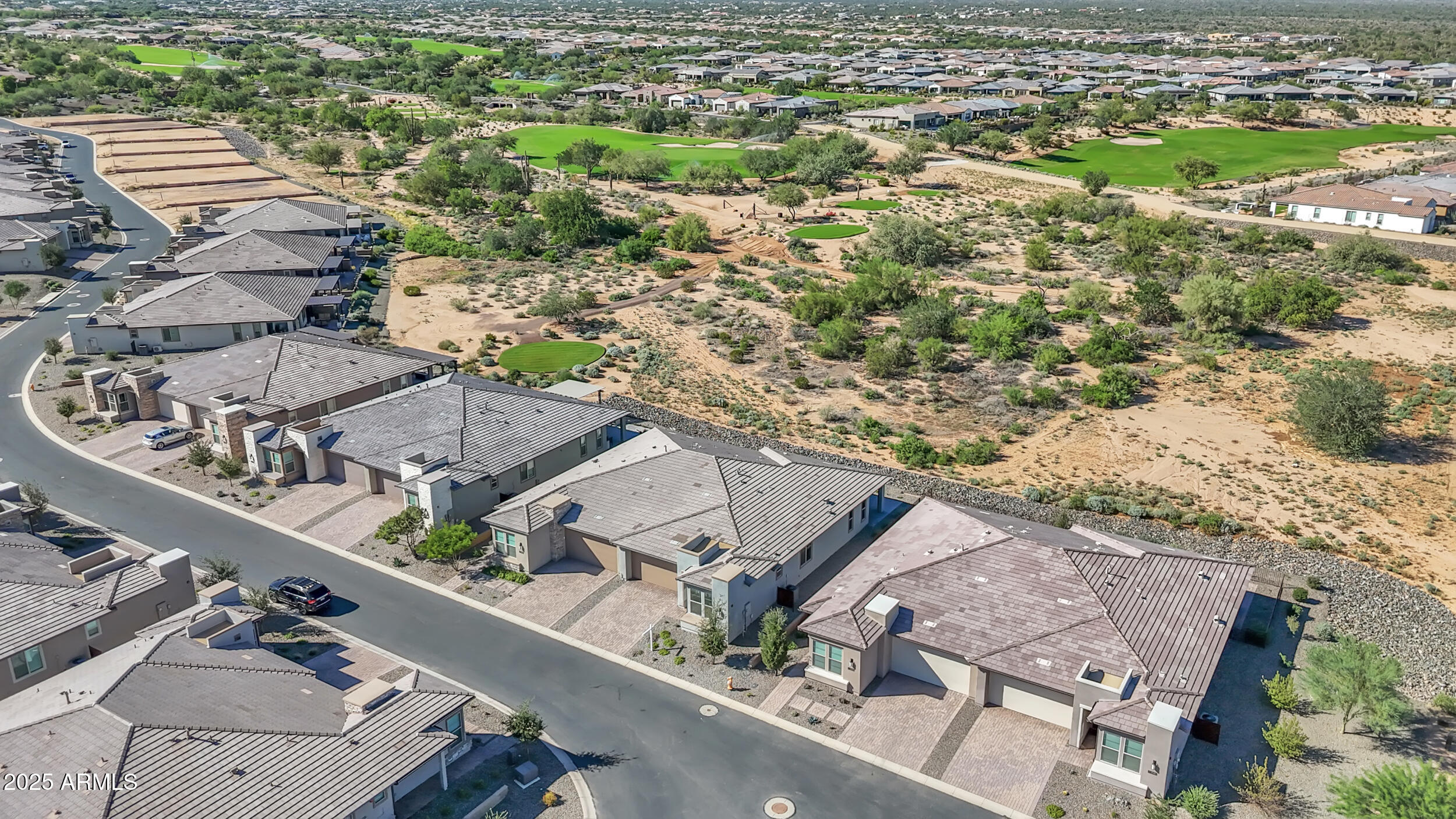 18328 East Spring Valley Court Rio Verde, AZ 85263 - Photo 36 of 39 an aerial view of multiple houses with yard