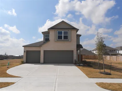 a front view of a house with a garage